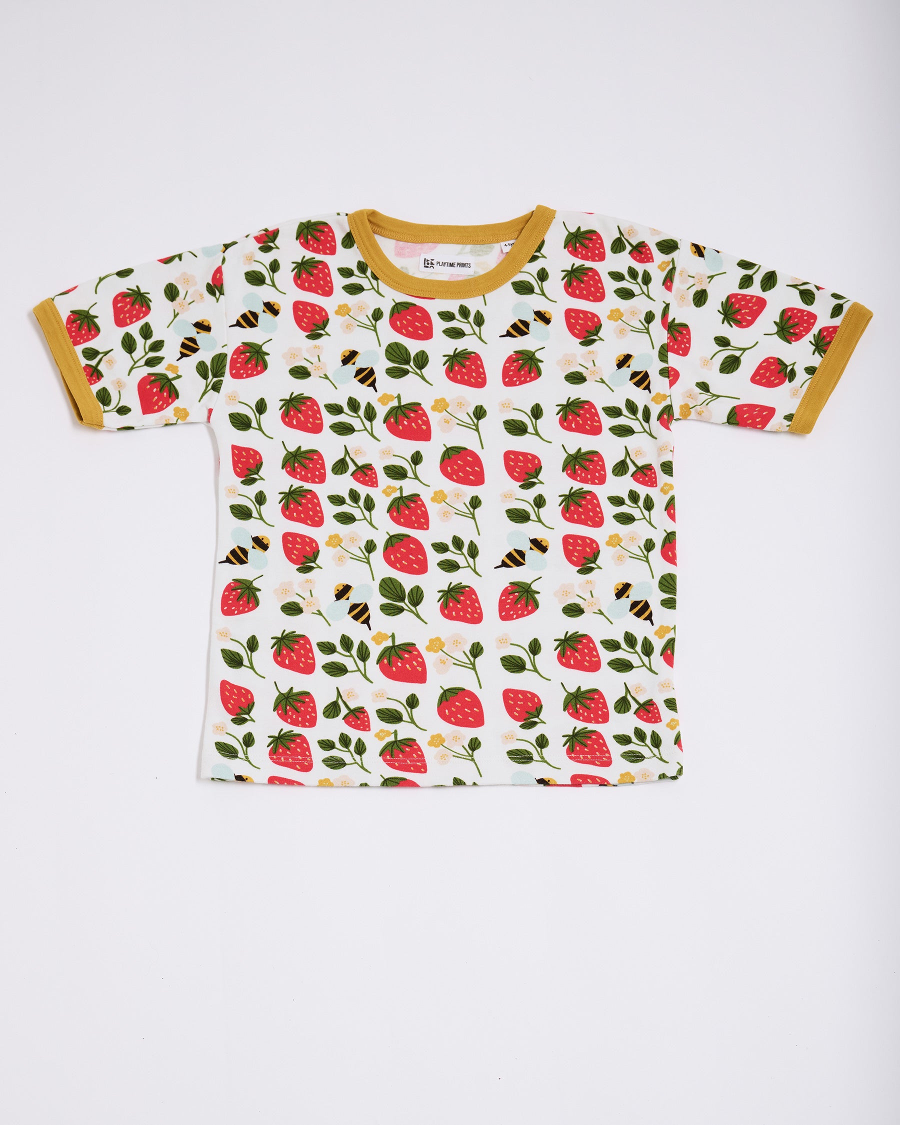 Front of short sleeved t-shirt featuring an all over strawberry and bees print with contrast honey neck and sleeve trim.