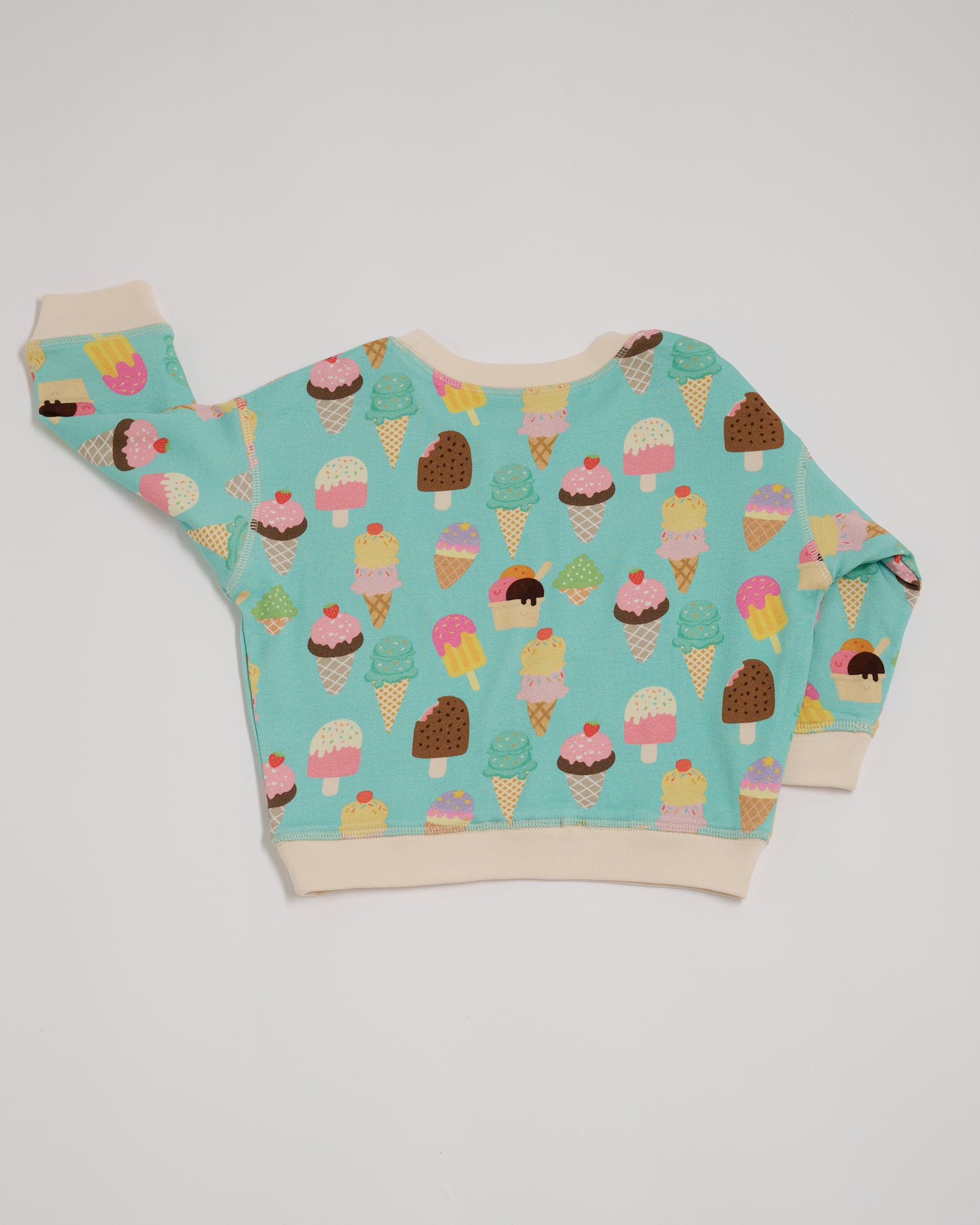 Back of sweatshirt featuring an all over turquoise ice cream print with contrast vanilla neck and sleeve trim.
