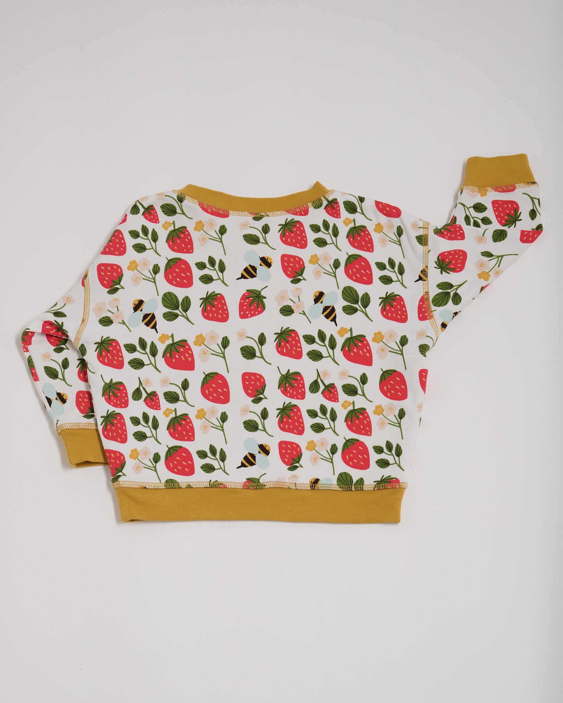 Back of sweatshirt featuring an all over strawberry and bees print with contrast honey neck and sleeve trim.