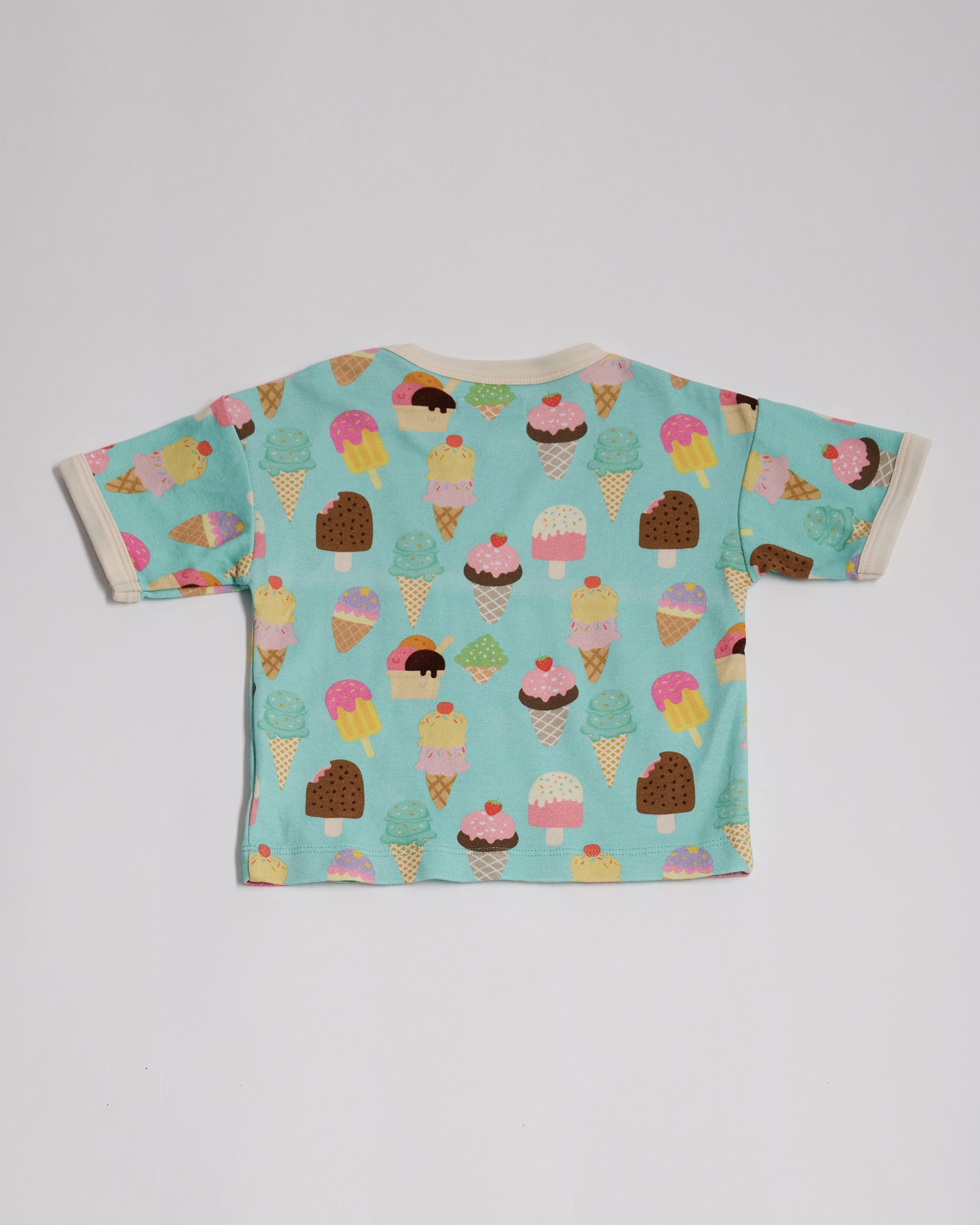 Back of short sleeved t-shirt featuring an all over turquoise ice cream print with contrast ecru neck and sleeve trim.