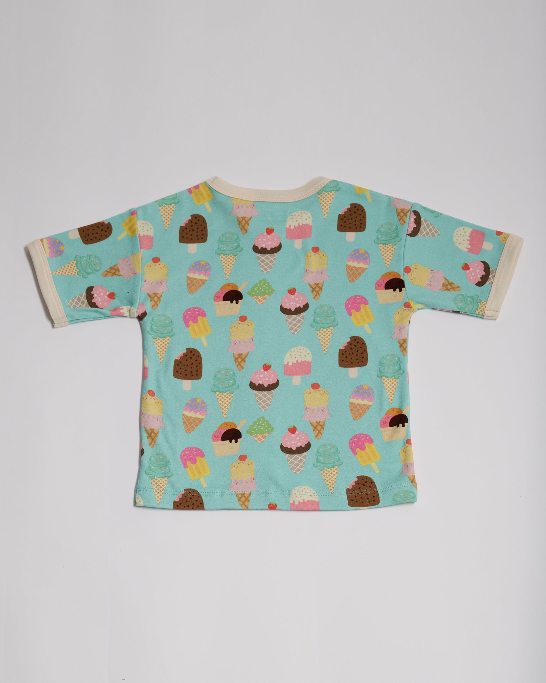 Back of short sleeved t-shirt featuring an all over turquoise ice cream print with contrast ecru neck and sleeve trim.