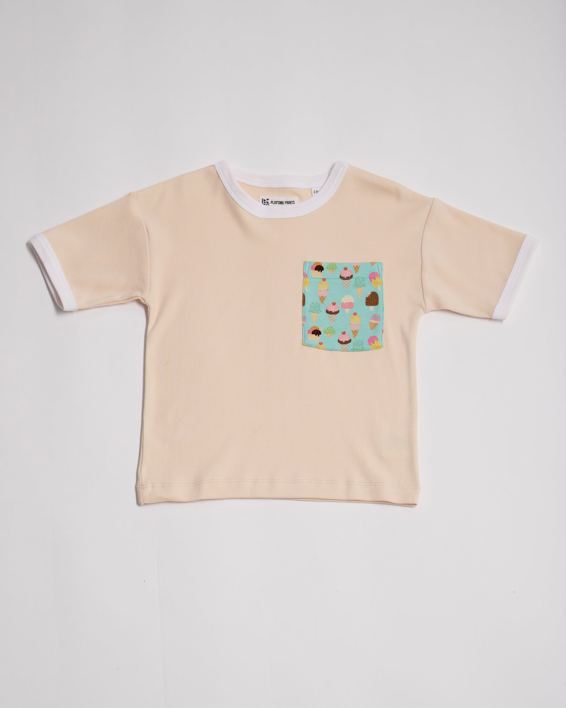 Front of vanilla coloured short sleeved t-shirt with bright ice cream print square chest pocket and white neck and sleeve trim.