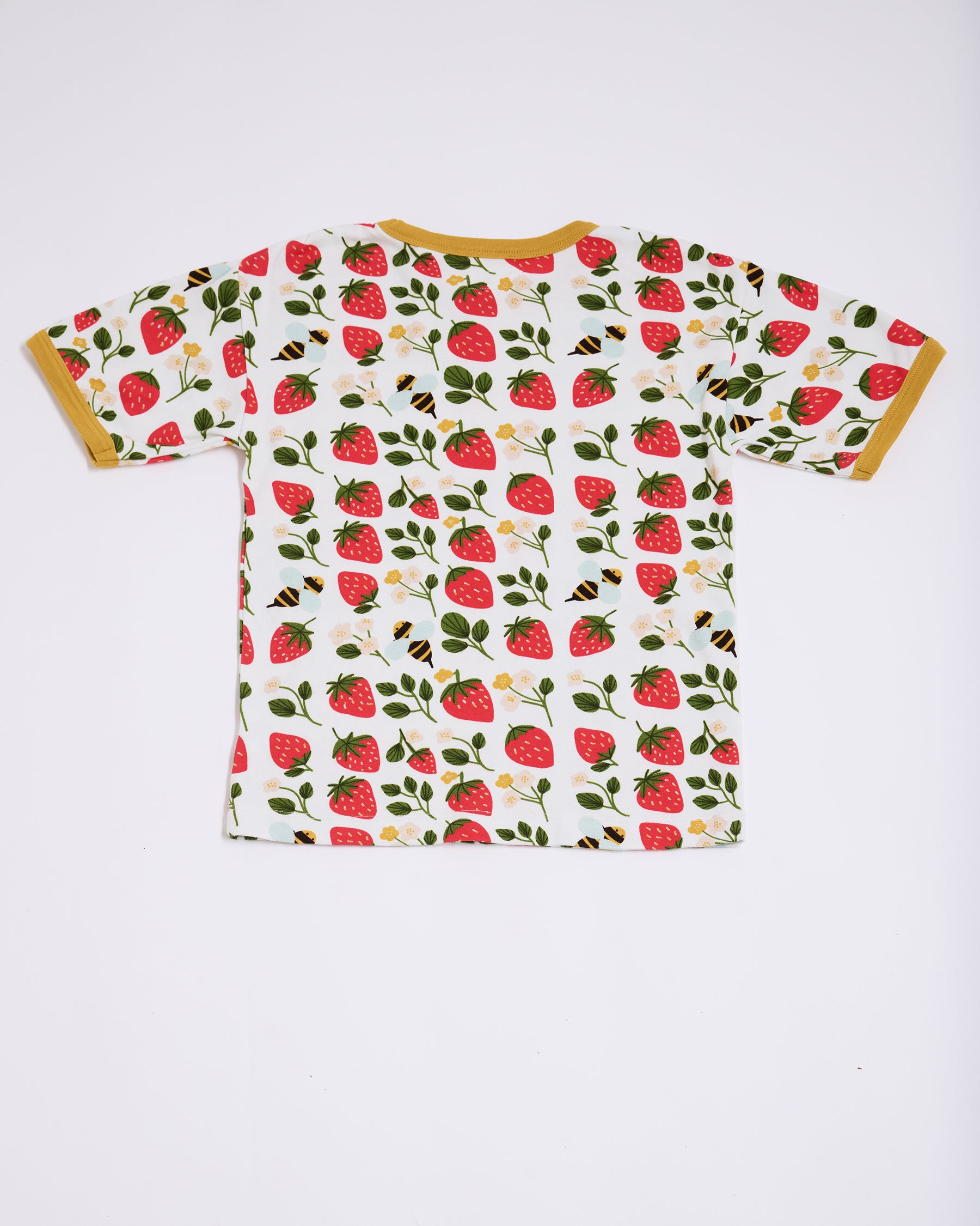Back of short sleeved t-shirt featuring an all over strawberry and bees print with contrast honey neck and sleeve trim.